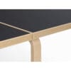 8431123_Aalto-Table-foldable-DL81C-extended,-legs-natural-lacquered,-top-black-linoleum,-close-up_master